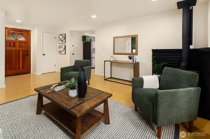 Living room flowing seamlessly into kitchen space.