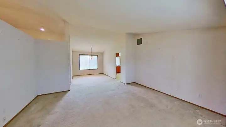 Living room with dining room on the background