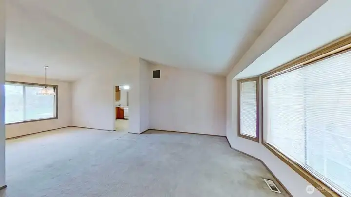 Living room with dining room to the left