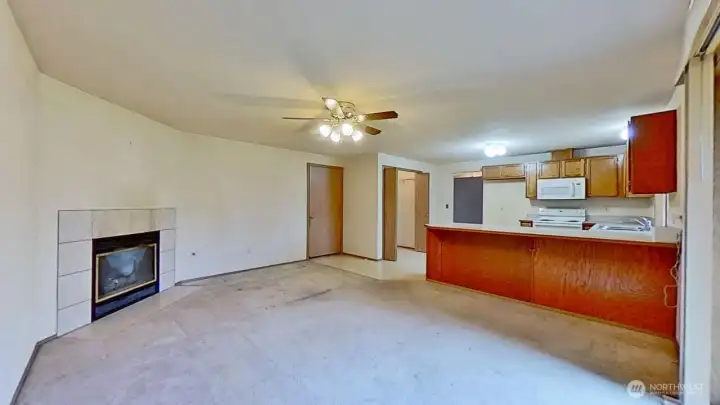 Family room with gas fireplace off the kitchen