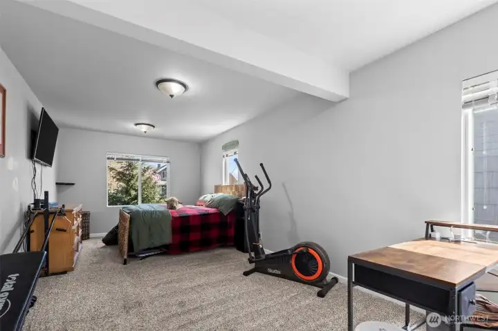 The primary bedroom on the main floor primary is very expansive.