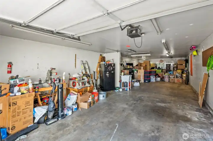 Don't mind the items the sellers are moving but you can see with half the home packed up you can still see how much space this garage really offers.