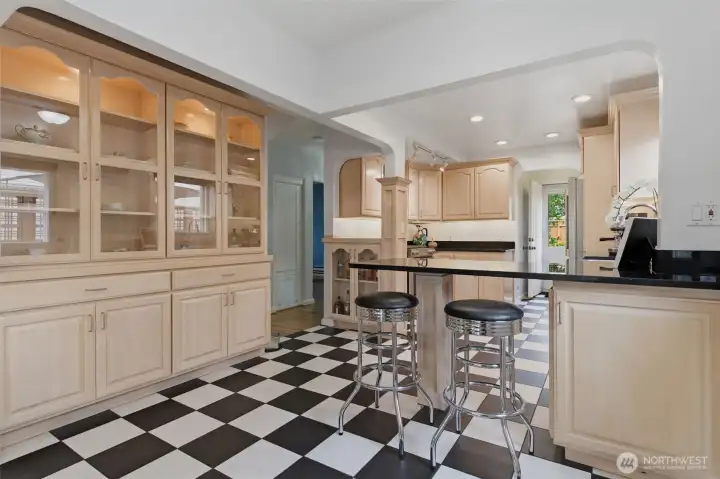 Display your beautiful dishes in the lighted custom cabinets.