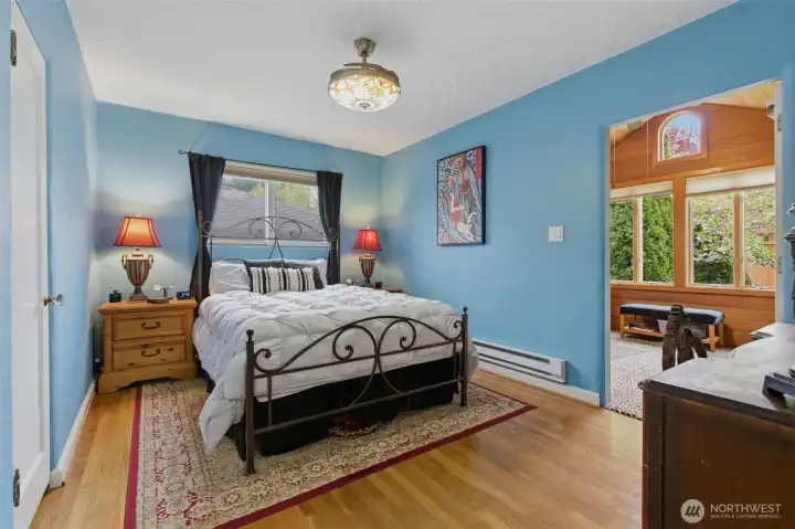 Main floor primary bedroom with his and her closets.