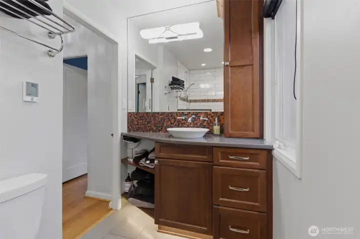 Updated main level 3/4 bathroom with heated floors.