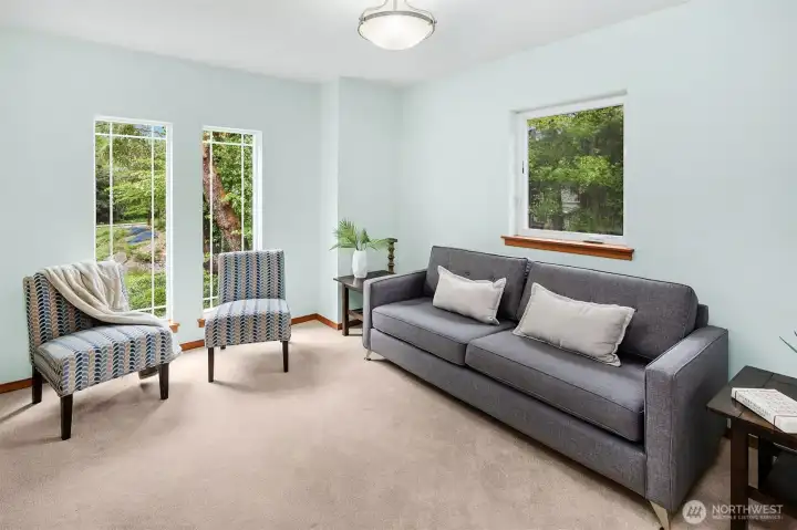 Upper level rec room, overlooking lush front yard.