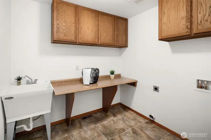 Utility/laundry room on upper level.
