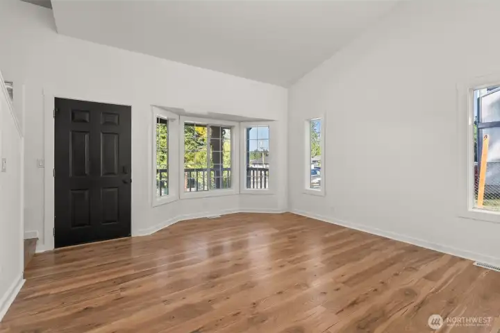 Be greeted by vaulted ceilings and lots of natural light!