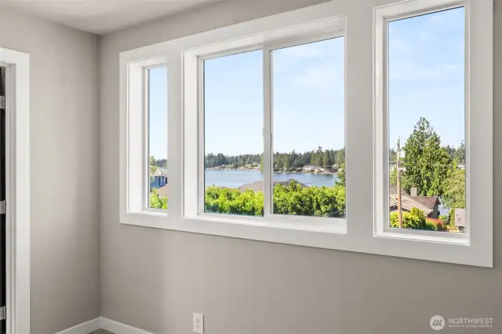 Enjoy views of the lake from your owners suite bedroom!