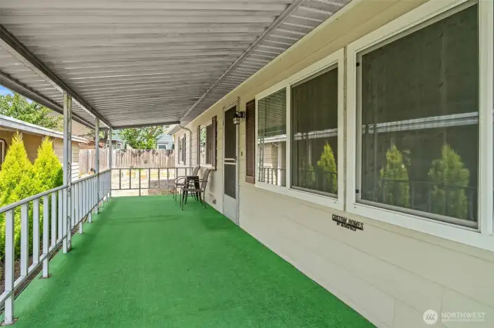 Spacious covered front porch for a morning cup of coffee. Spacious covered front porch for a morning cup of coffee.