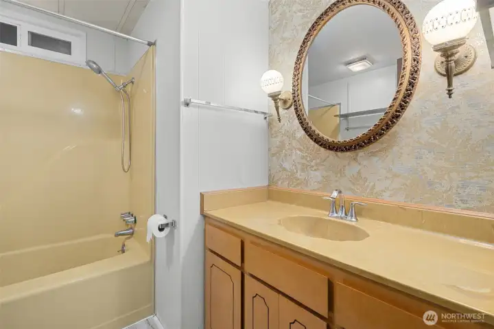 Full bathroom serves the secondary bedroom and any guests. Full bathroom serves the secondary bedroom and any guests.