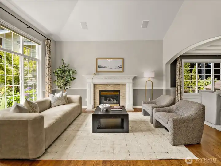 Vaulted ceilings and a large picture window make hosting guests or enjoying afternoon tea a breeze in this space. Vaulted ceilings and a large picture window make hosting guests or enjoying afternoon tea a breeze in this space.