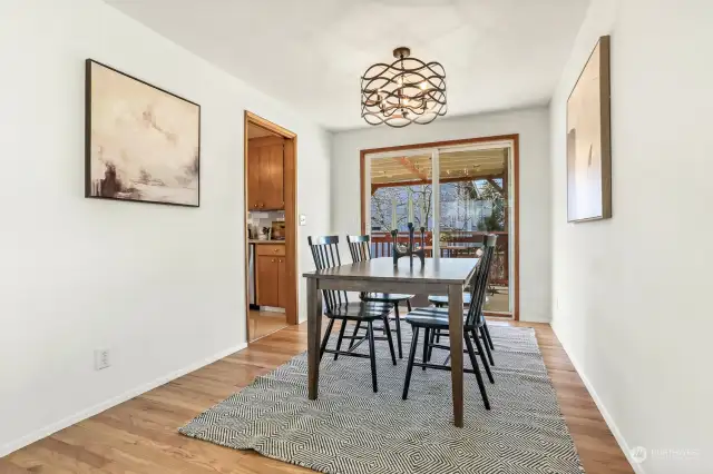 Dining area flows out to a covered back deck.