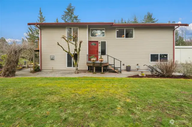 The front door faces east. Or, access the home via the attached 2-car garage.