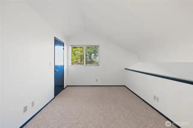 Second floor bedroom showing walk-in closet to the left