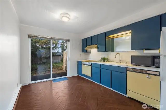 Your kitchen with its retro color cabinets and appliances