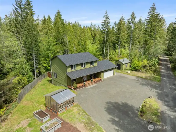Ariel view of property with large driveway area