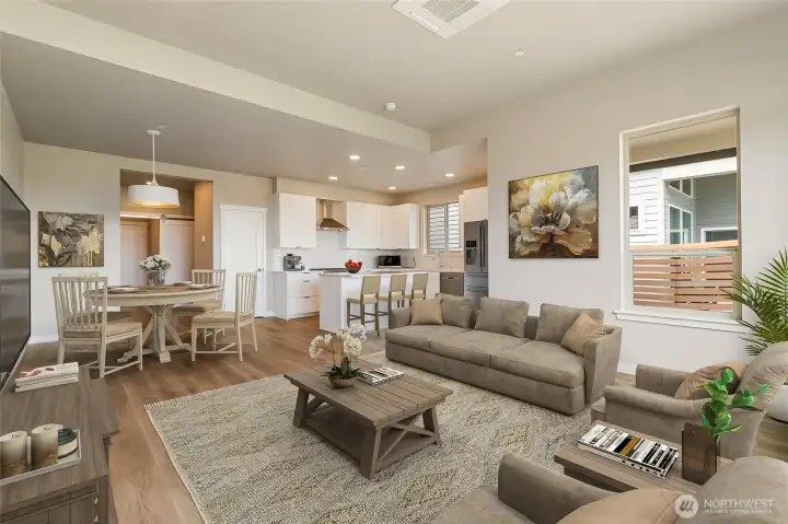 Living/kitchen, staged photo of a different unit but the same Cypress model for reference only.
