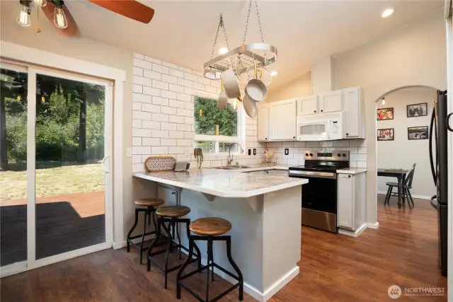 The kitchen is the hub of the home and the adjoining dining room will make entertaining a breeze!