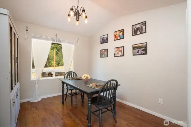 The formal dining room is adjacent to  the kitchen & living room.