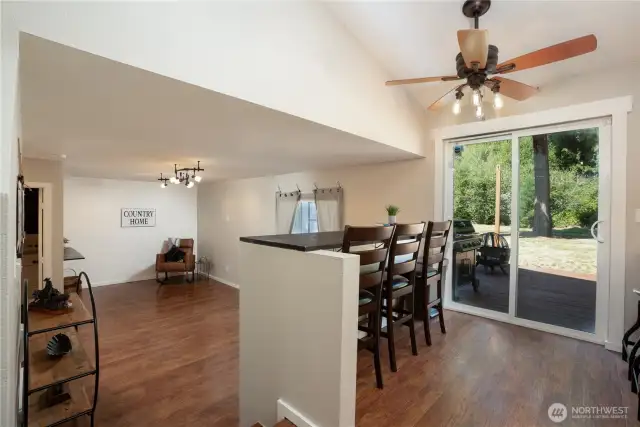 The second bar adds the perfect blend combining the kitchen area & lower level together - optimal for gatherings & entertaining. The slider leads you to the spacious deck in the private backyard!