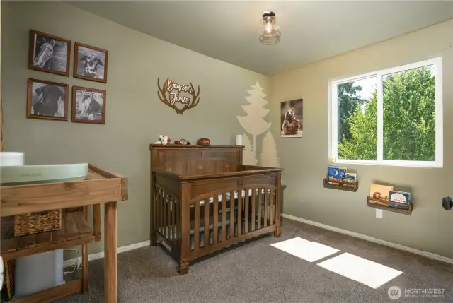Second of three bedrooms on upper level.
