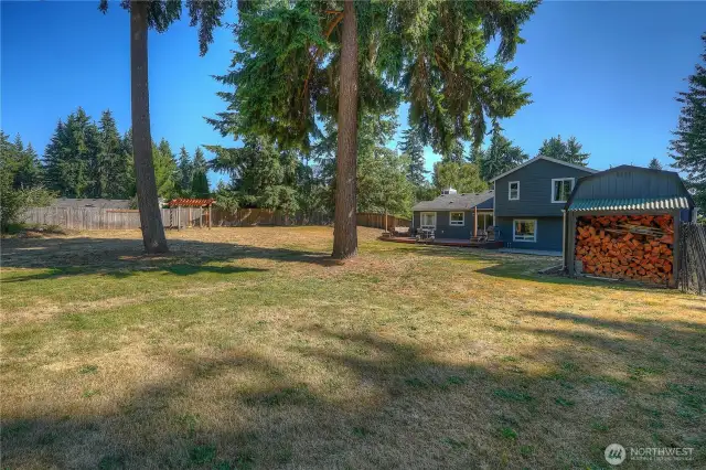 Let your imagination run wild with all the fun you can have in this fully fenced backyard!