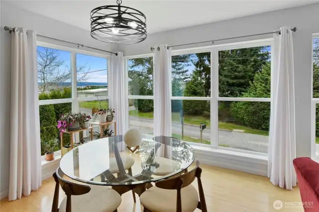 The corner dining area on the second floor has a water view.