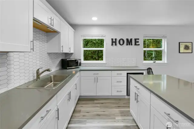 Beautiful partial kitchen space on the entry level.