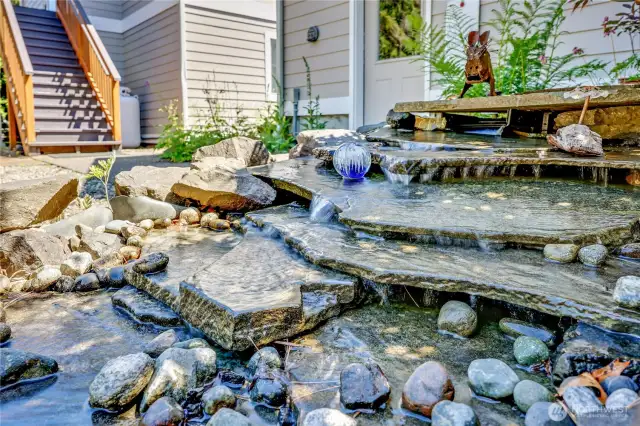 Water feature behind the garage.