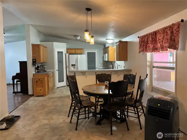 There is a nice eating bar between the dining room and kitchen, plus plenty of space for a large table if you need.