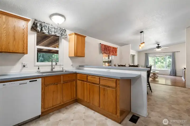 Eating bar shares space with the dining room.