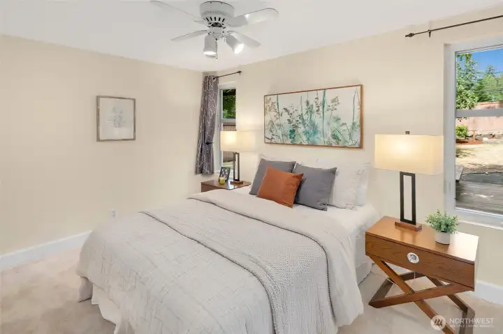 Primary bedroom with ensuite bath and California Closet built-ins.