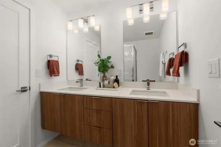 Double sinks with room between- two can easily get ready at the same time