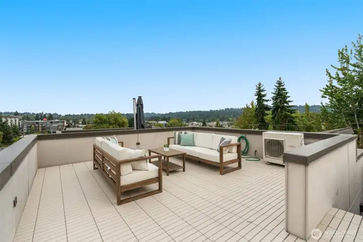 Expansive deck with low maintenance surface- great place to relax and watch the seaplanes come and go!