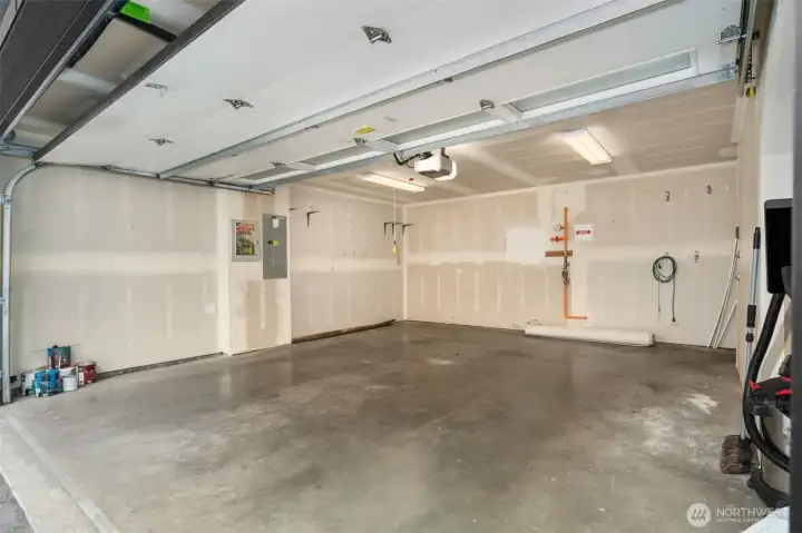 No skimping on the garage size- one that's easy to get in and out of and room for two cars- plus toys! And have I mentioned EV ready?