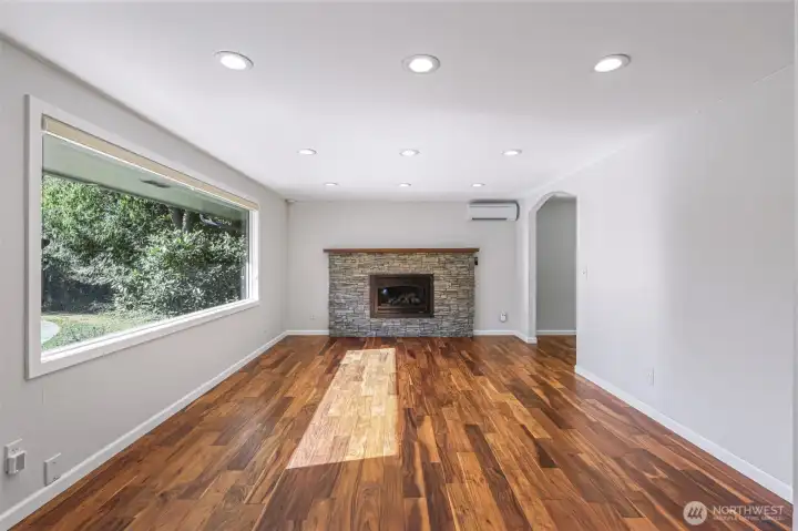 Entry living room with propane fireplace insert