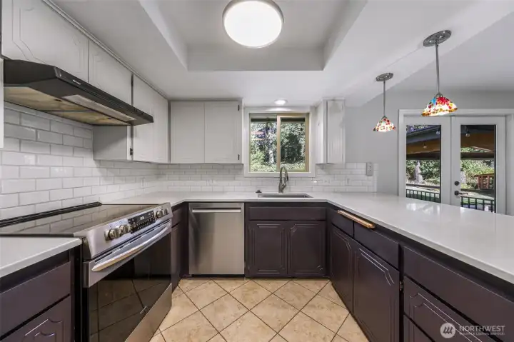 Kirchen with new counters, sink and tile flooring