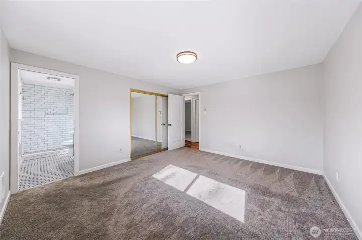 upper level primary suite with new 3/4 bathroom & wlak in shower