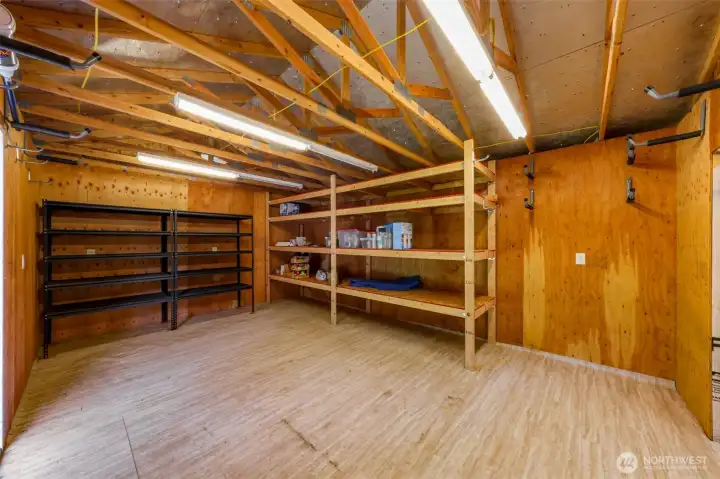 LArge shed/ shop in back yard with large end double doors to park a ridingf lawn mower and more