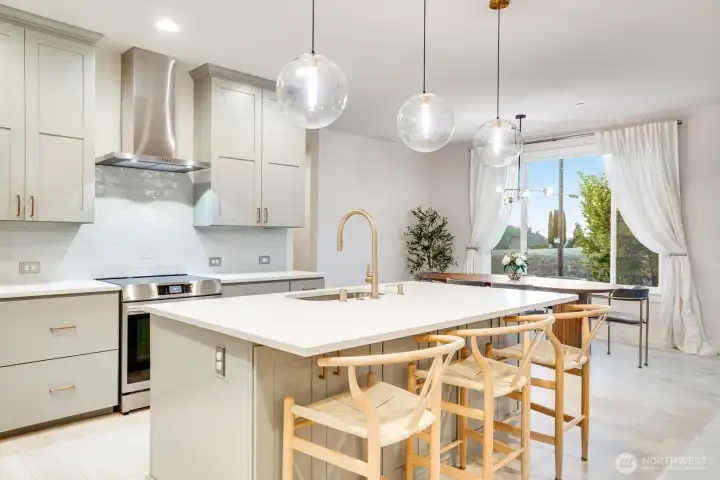 Extra large island with seating. Cooking, hosting and enjoying time together just got a little more fun.