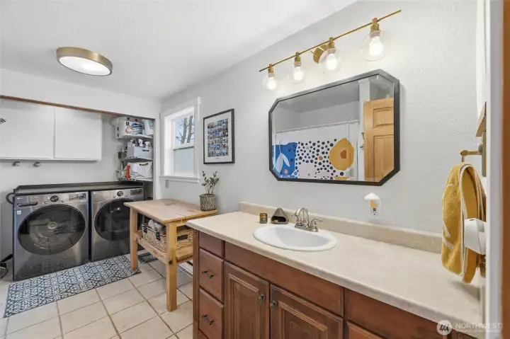 Upstairs there is also a large full bathroom with attached laundry room.