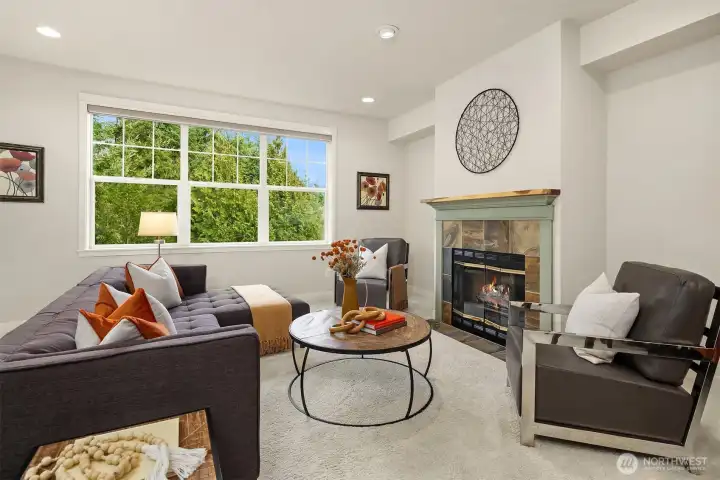 The living room features a gas fireplace.