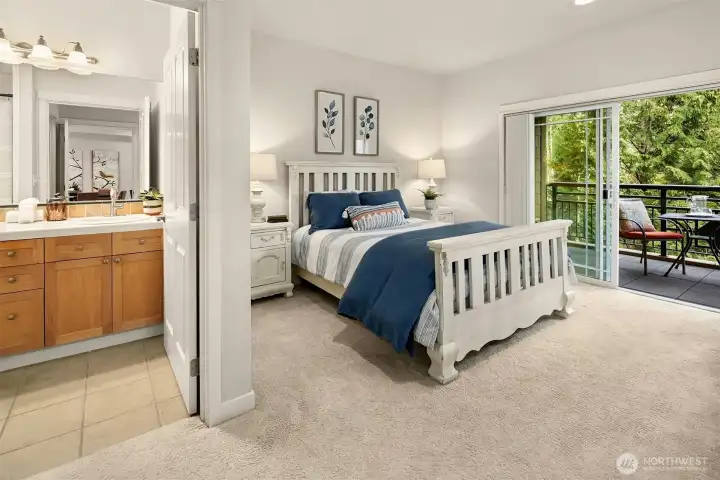 The primary suite is truly a private retreat. You can see and hear Issaquah Creek from the balcony, with access from both the primary suite and the living room.