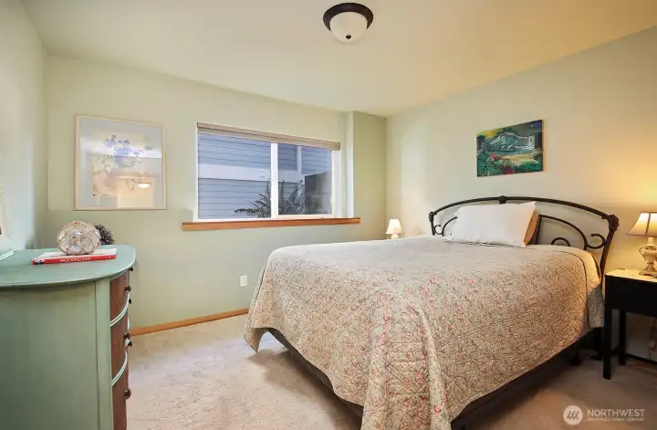 The closet in this room is a walk in closet with California Closets organization built ins.