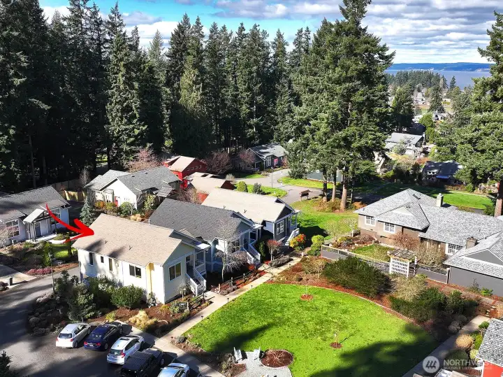 Convenient guest parking next to house...  500 gallon underground propane tank located in landscaped side yard— only needs filling / topping off maybe once a year or less.