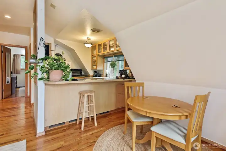Main Home. Dining area off the living room and kitchen.