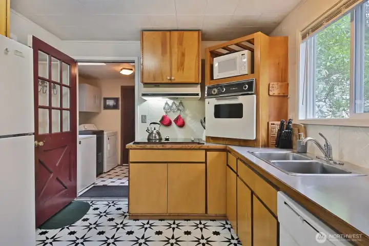 Cabin - Laundry room/mud room. Electric cooktop, stove, d/w and refrigerator.
