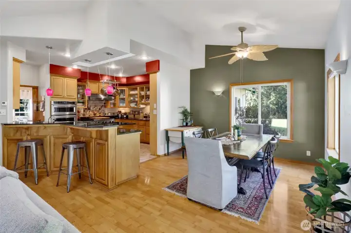 The chef's kitchen is open to the dining room and family room