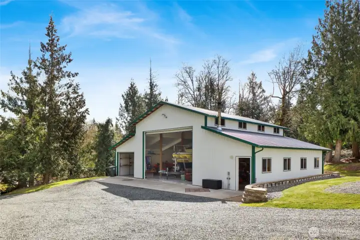The shop is huge...note the scale of the shop with the large boat inside
